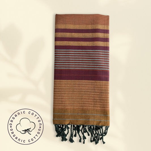 fouta en coton biologique, couleurs aubergine, cuivre et fines rayures bleu pâle, de fabrication artisanale, modèle exclusif lana fares